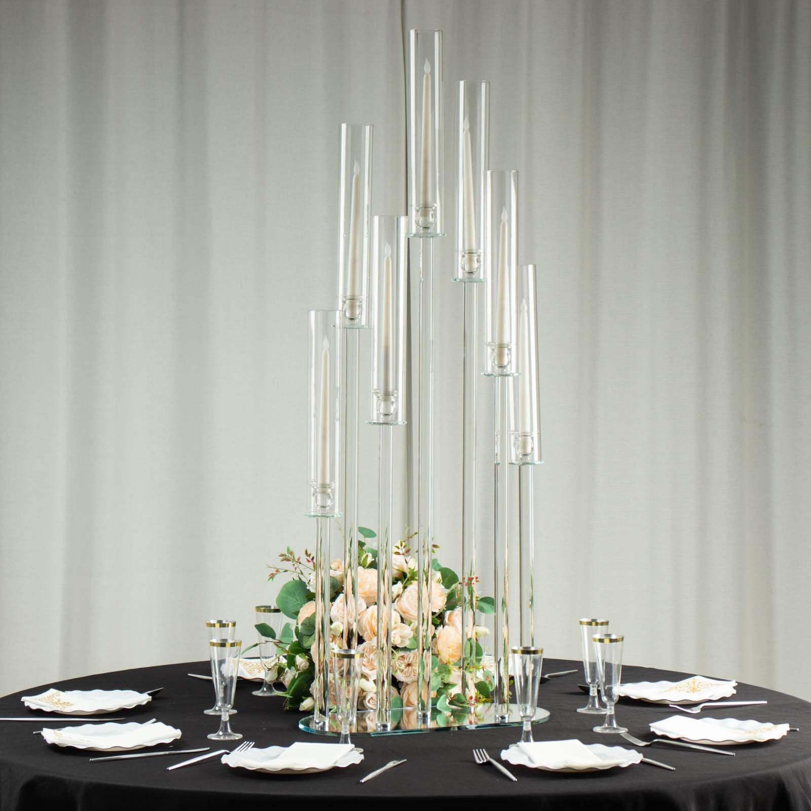 Clear crystal 7-arm candlestick stand centerpiece with hurricane shades.