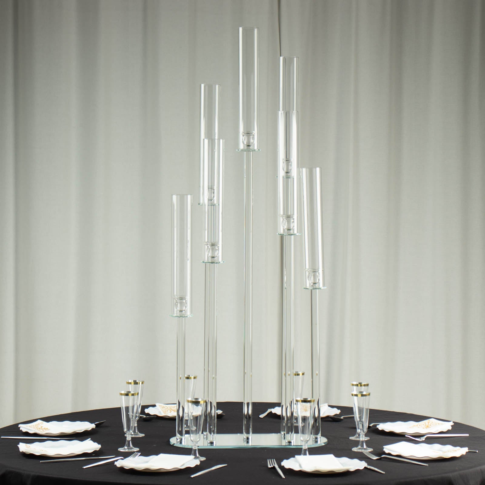 Clear crystal 7-arm candelabra centerpiece with hurricane shades.