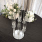 Clear 7 arm crystal candelabra candle holder on a mirror base.