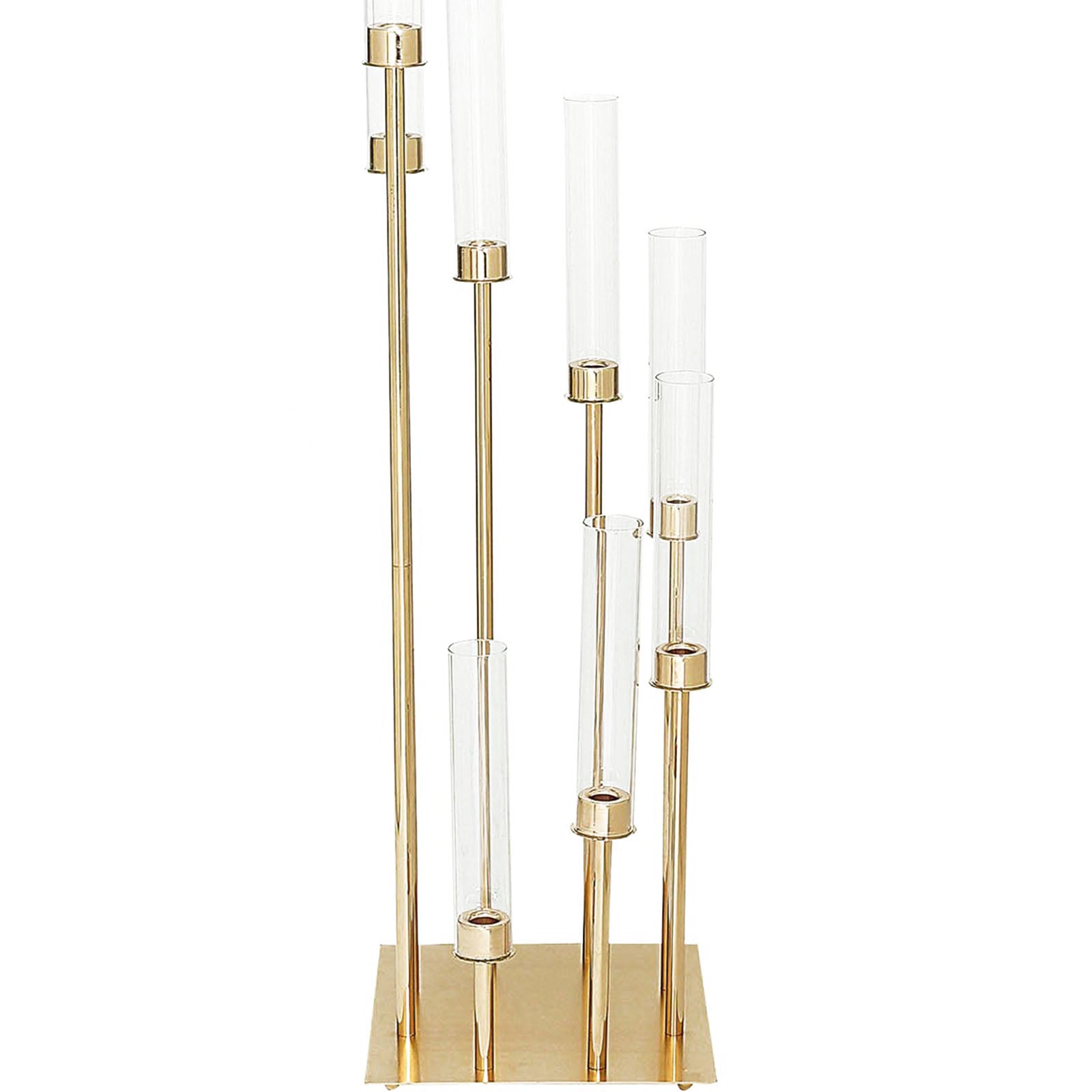 Gold 8 arm candle holder with clear glass shades in large arrangement.