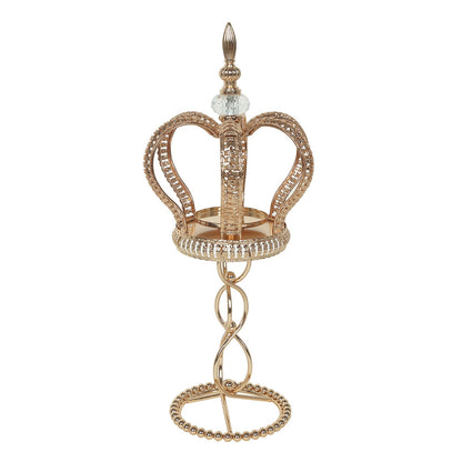 Gold crown pillar candle holder with jeweled accents.