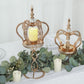 Gold metal crown spiral pillar candle holder stand with jeweled votive centerpiece.