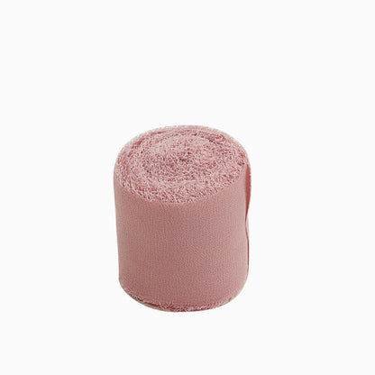 Dusty rose chiffon ribbon roll for bouquets and gift wrapping.