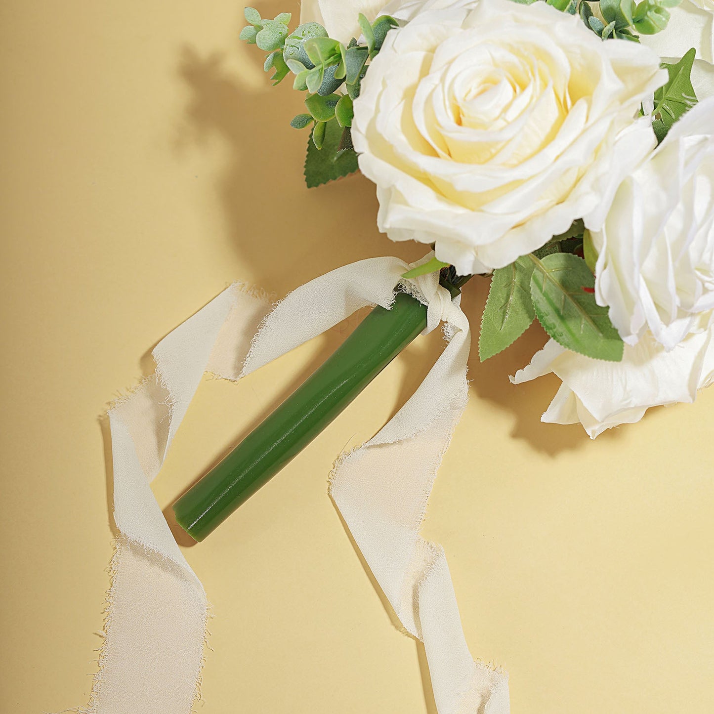 Ivory silk-like chiffon ribbon roll for bouquets and gift wrapping.
