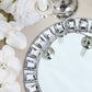 13" Silver Jeweled Rim Glass Mirror Charger Plates with elegant design.