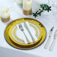 Gold metallic charger plates with rhinestone rim on a table setting.