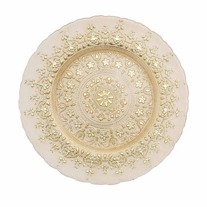 Gold ornate glass serving plate with intricate design.