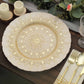 Gold ornate glass serving plate with intricate design.