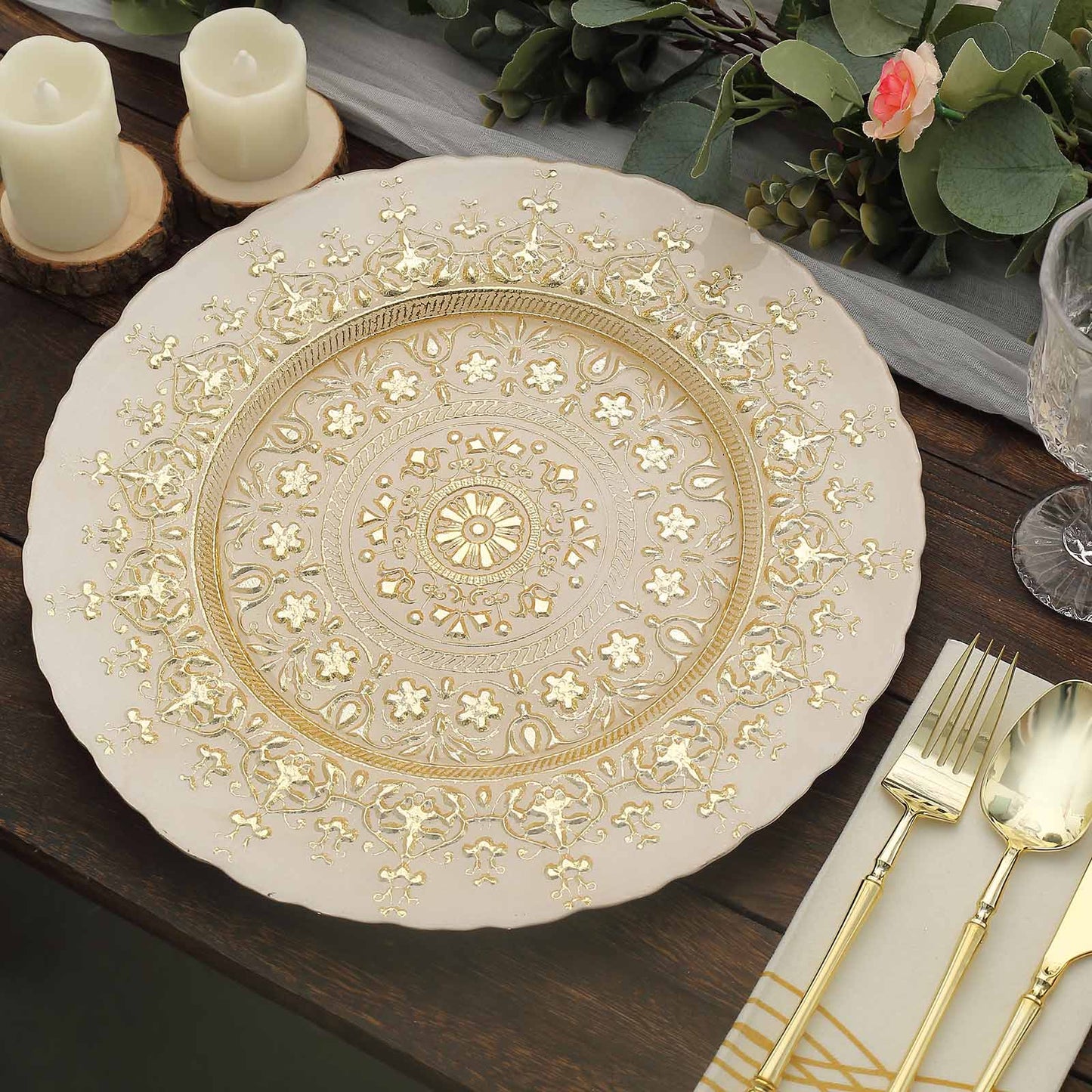 Gold ornate glass serving plate with intricate design.