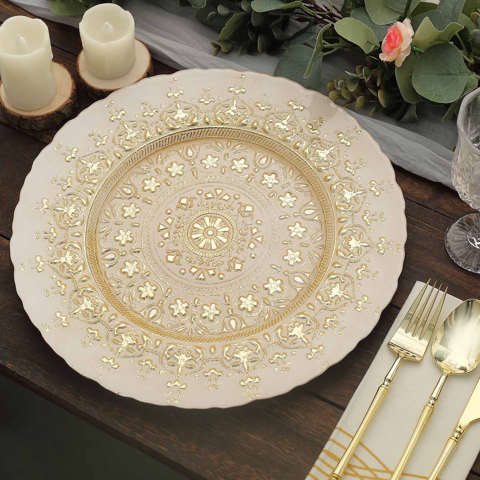 Gold ornate glass serving plate with intricate design.