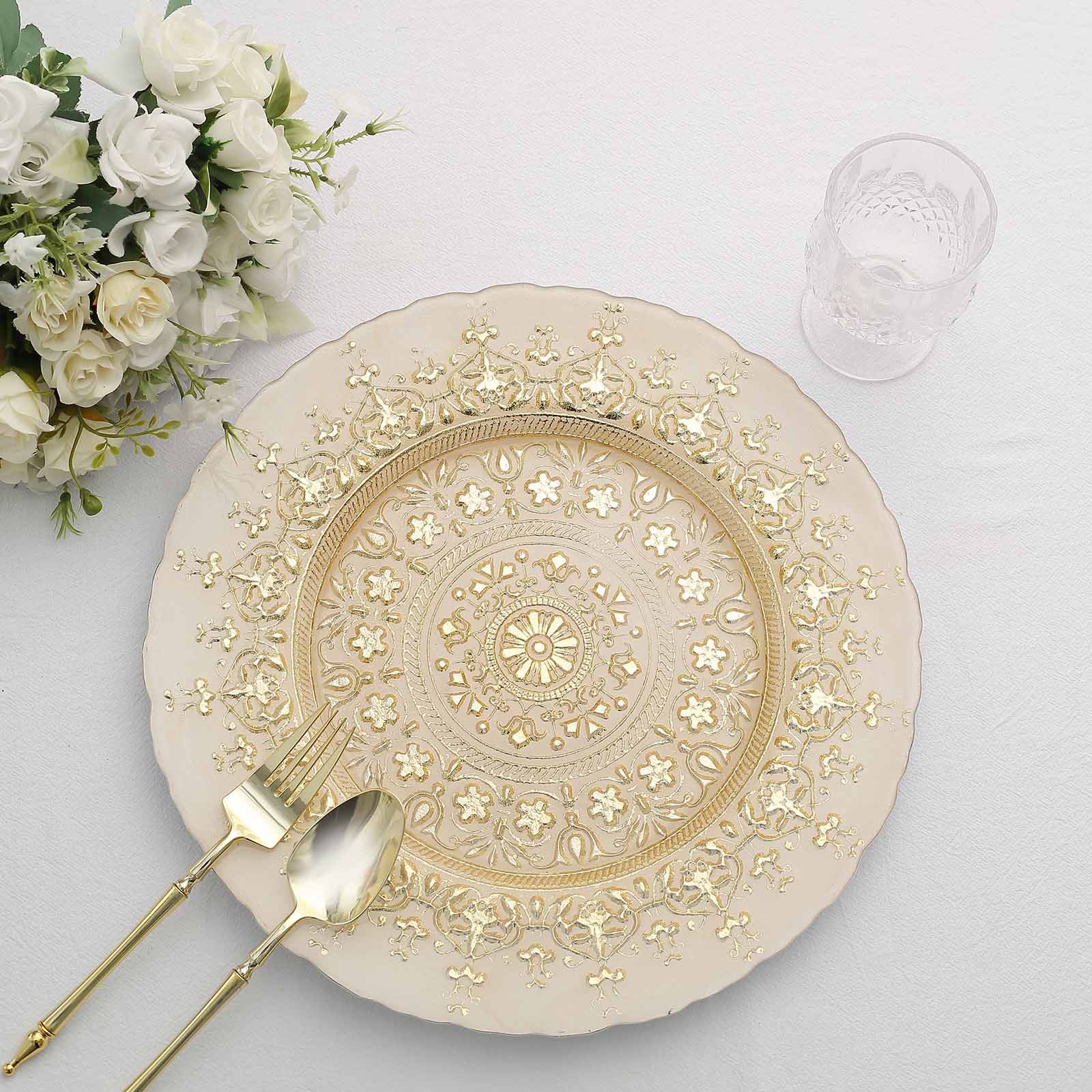 Gold ornate glass serving plate with intricate design.