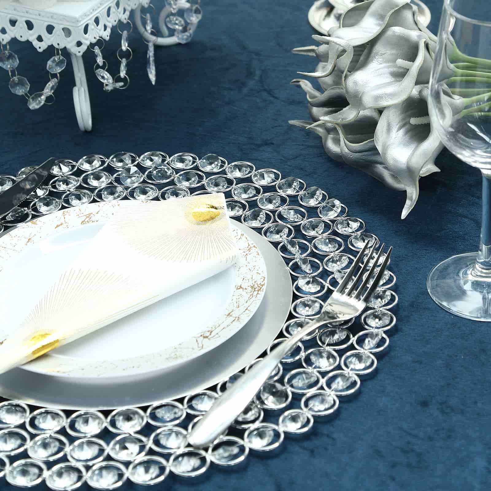 14" Silver Beaded Charger Plate on a blue table setting.