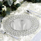 Silver beaded charger plate with acrylic crystals on a decorative table setting.