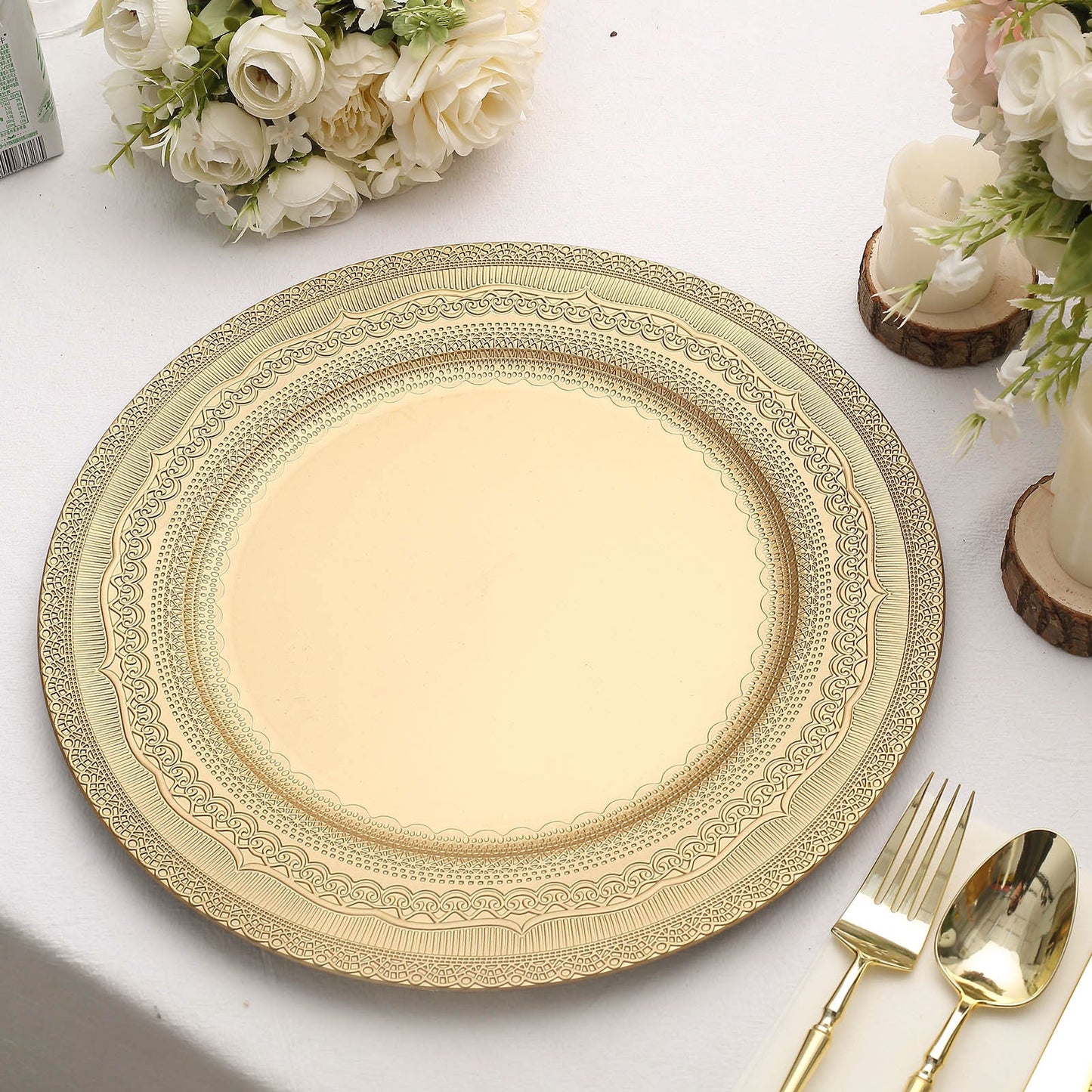 Gold rustic lace embossed acrylic plastic charger plate on a table setting.