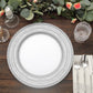 Silver rustic lace embossed acrylic charger plates on a wooden table.