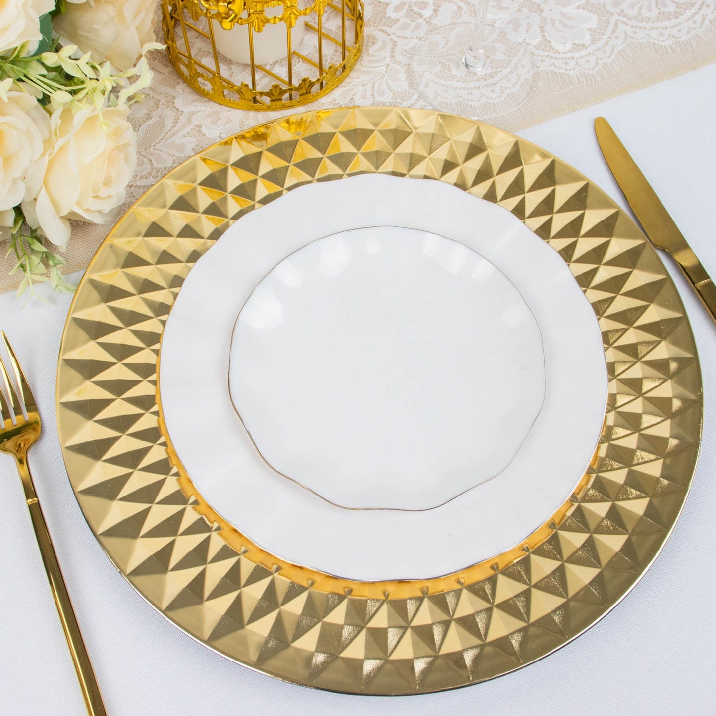 Shiny gold diamond disposable dinner serving plate on a table setting.