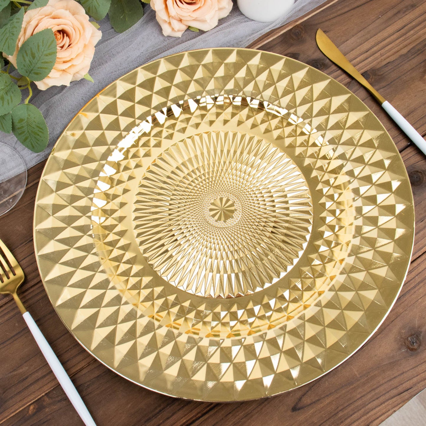 13" Sparkling Gold Diamond Disposable Dinner Serving Plate on a wooden table.