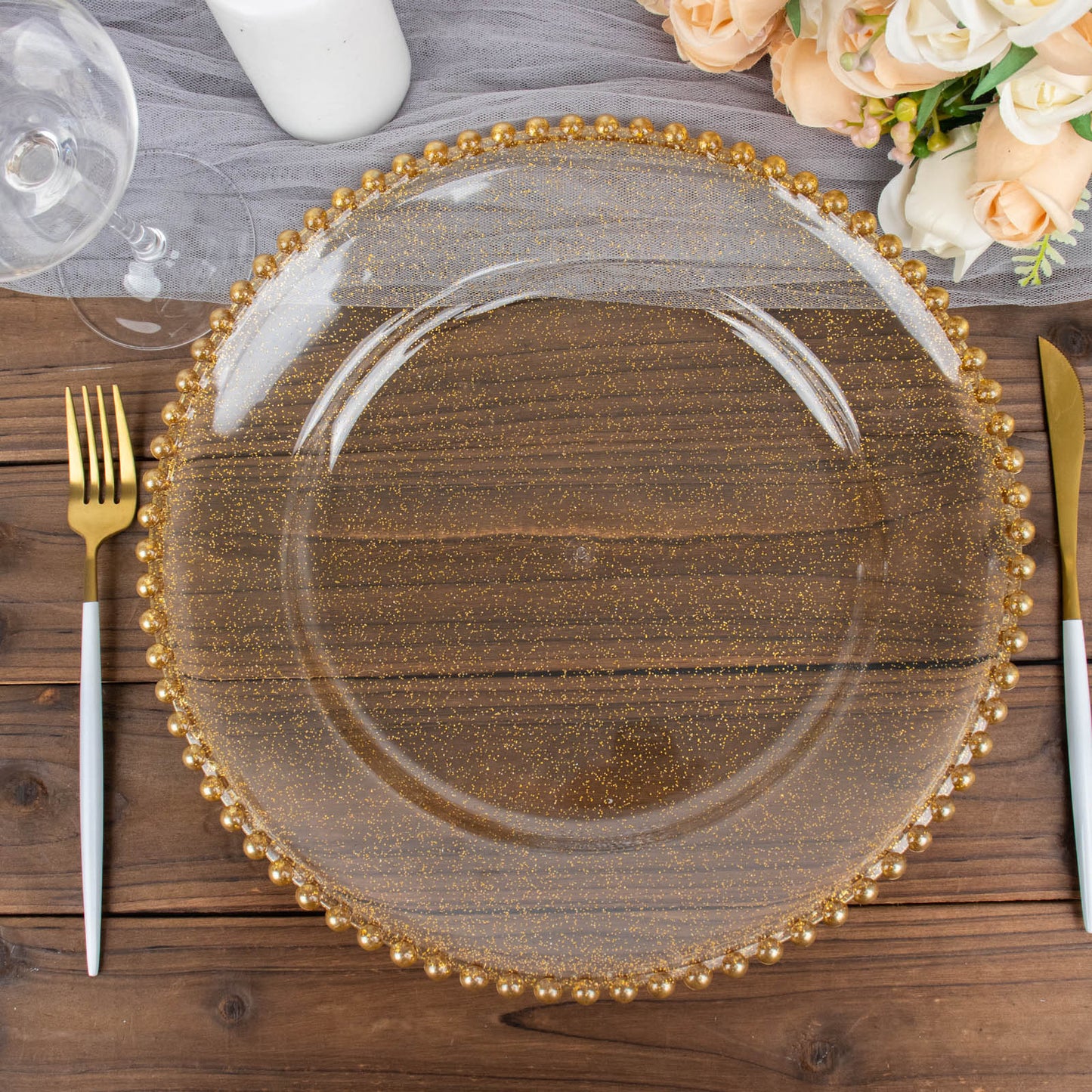 Clear gold glitter acrylic charger plate with beaded rim.