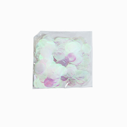 Iridescent round foil metallic table confetti dots in a clear bag.