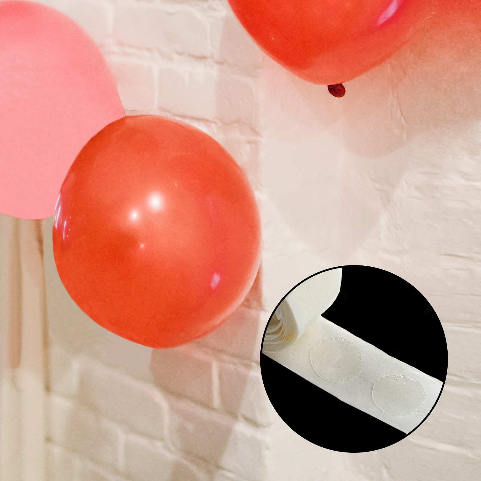 Clear removable balloon arch glue dots on red balloons.