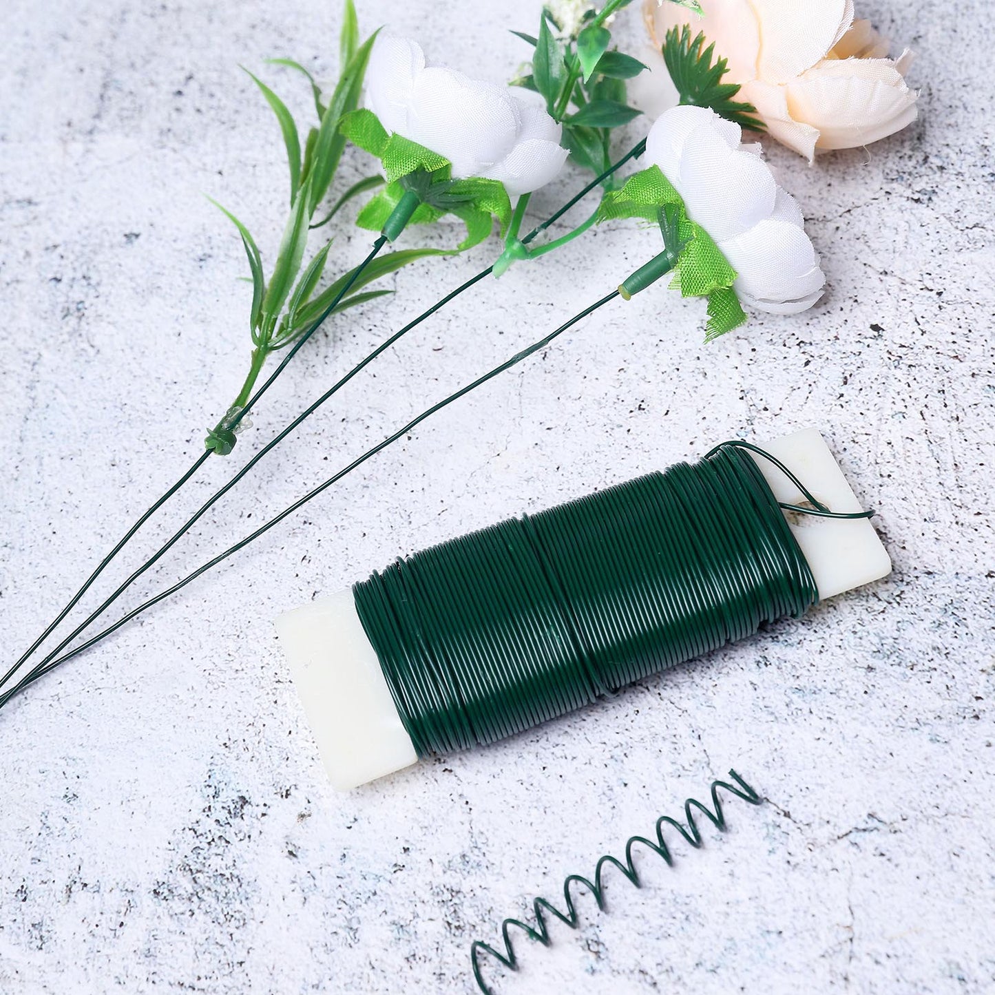 Green floral wire for DIY craft flower arrangements.