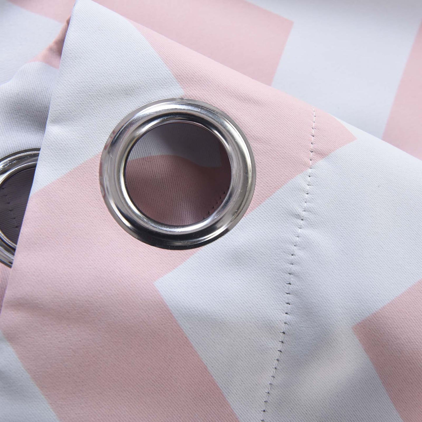 White blush chevron print thermal blackout curtain panel with grommet.