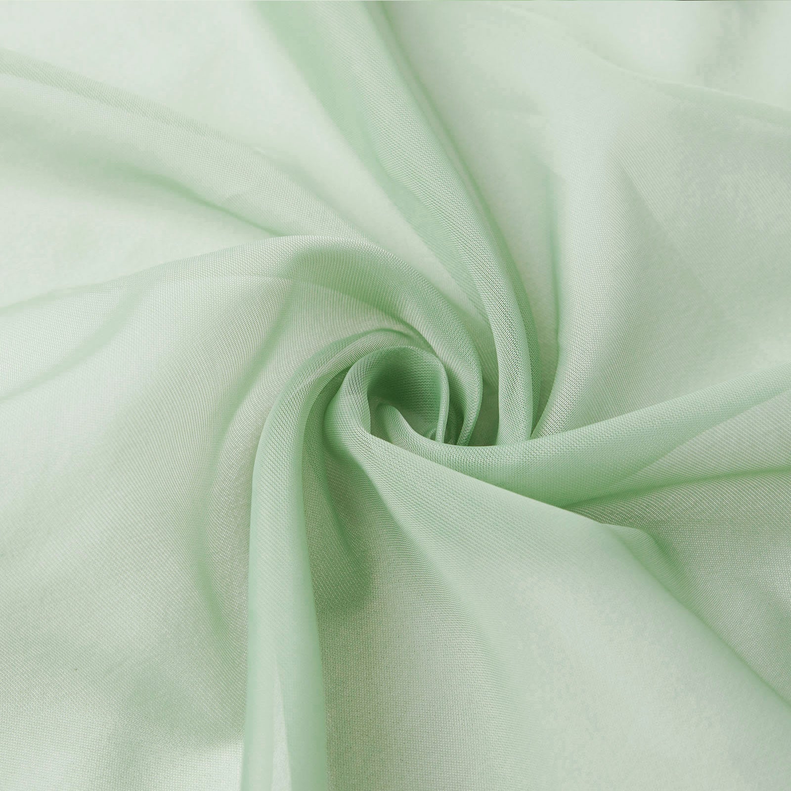 Sage green chiffon curtain panel, durable and flame resistant backdrop.