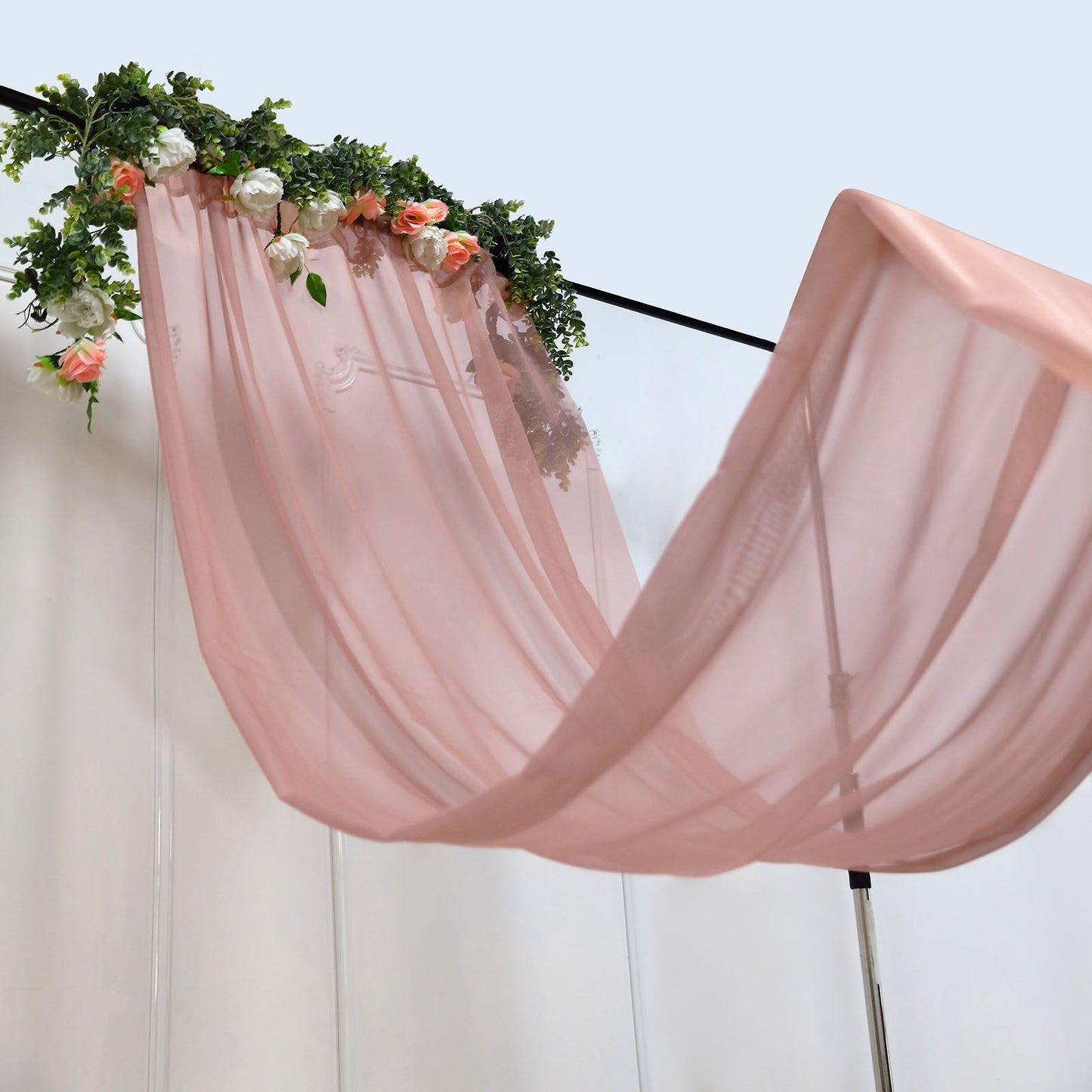 Dusty rose chiffon curtain panel with floral accents draping elegantly.