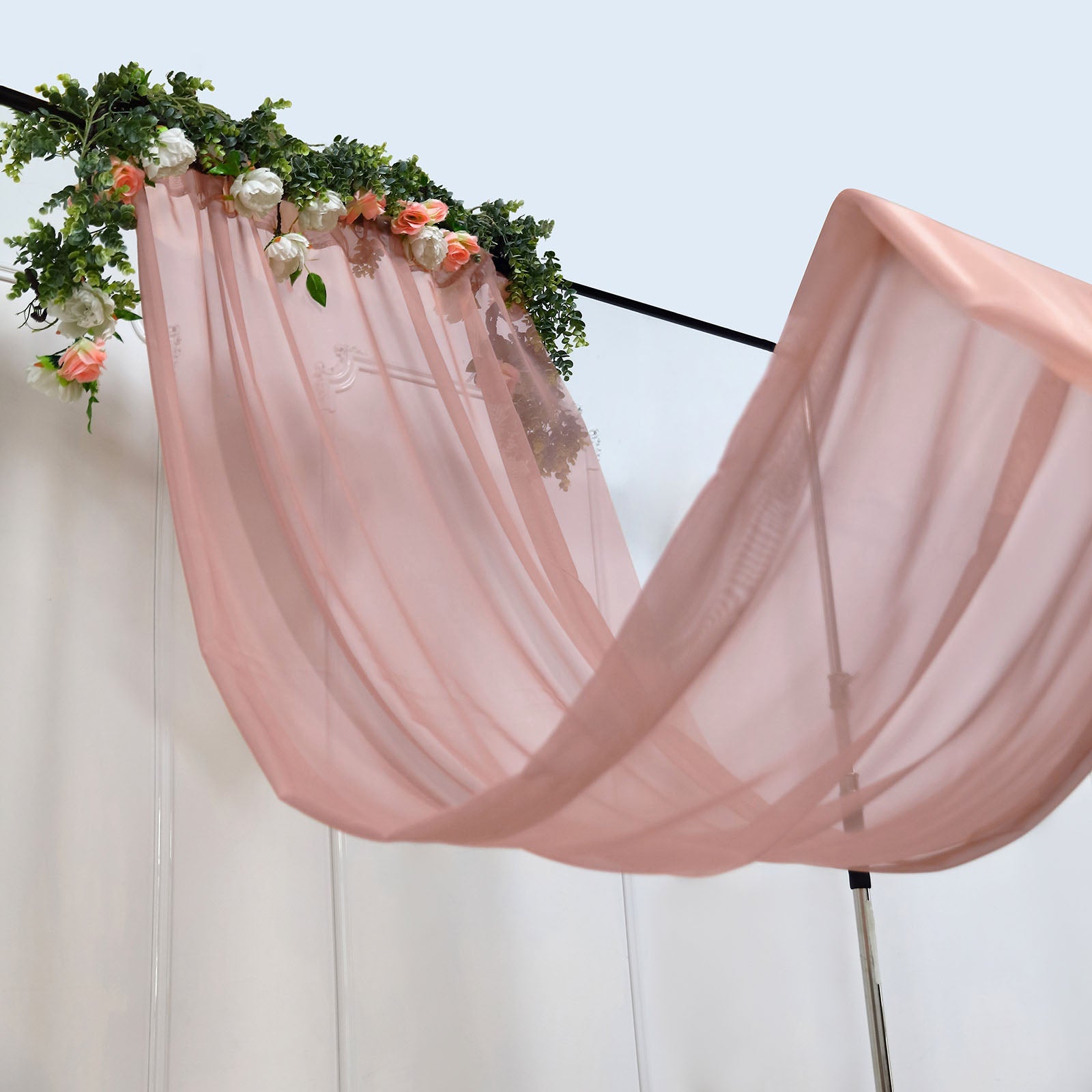 Dusty rose chiffon curtain panel with floral accents draping elegantly.