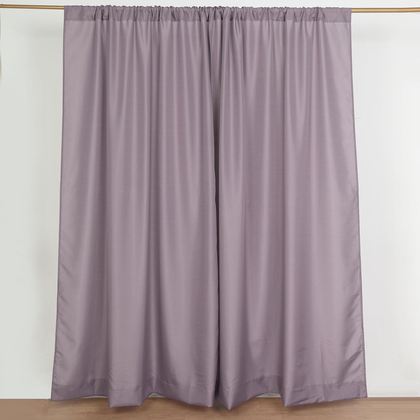 Violet amethyst polyester backdrop drape curtains with rod pockets.
