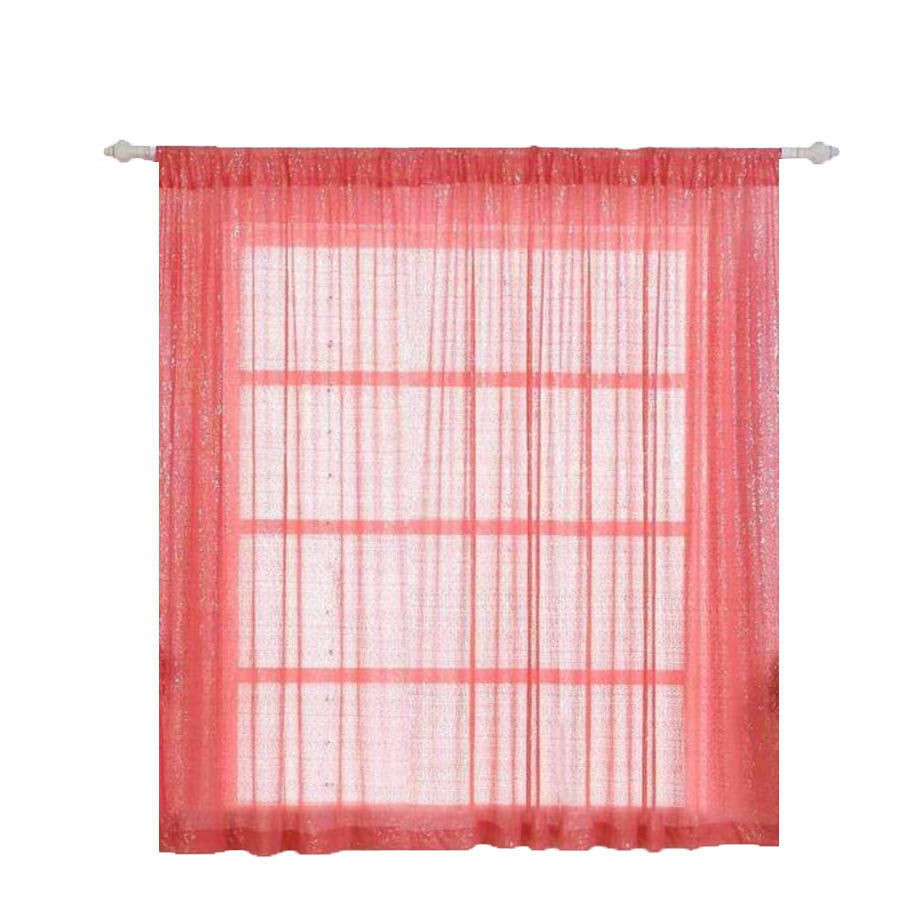 Coral sequin curtains with rod pocket window treatment panels.