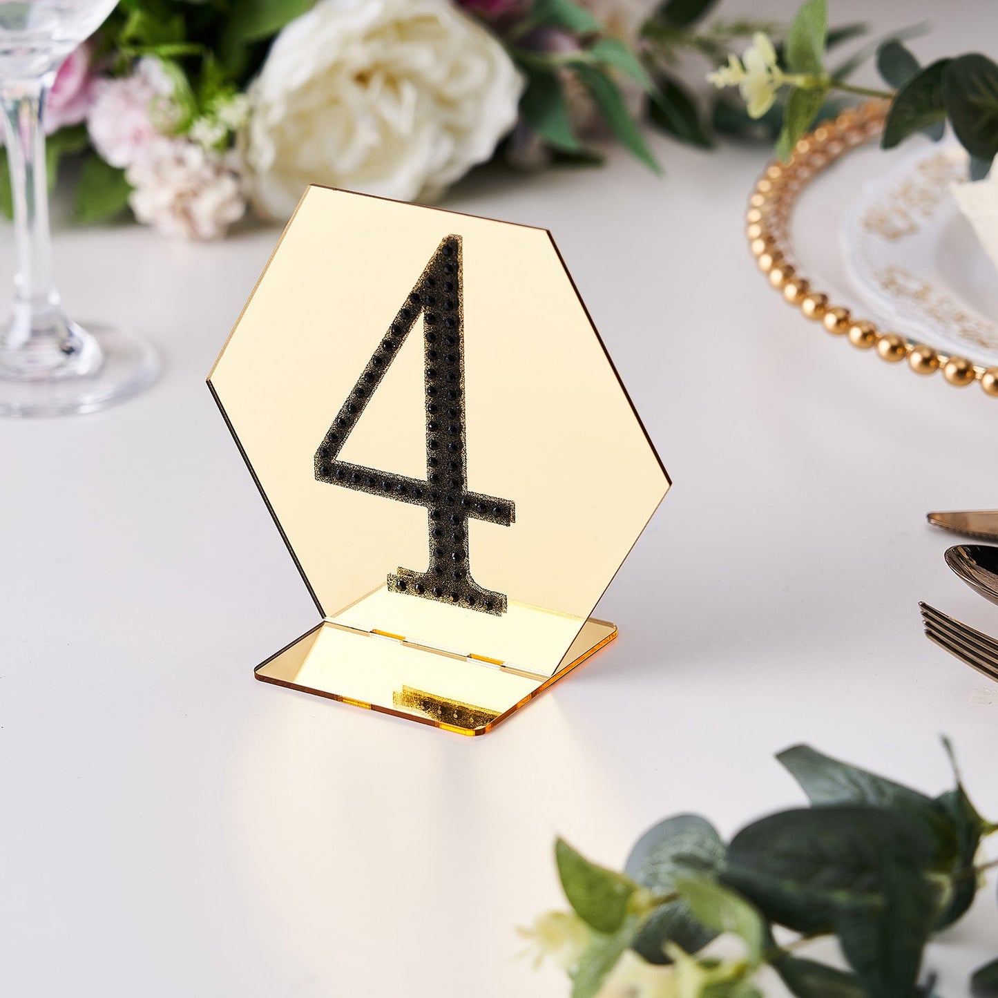 Black decorative rhinestone number 4 sticker for DIY crafts.
