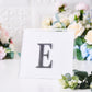 Black decorative rhinestone letter sticker "E" for DIY crafts.