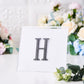 Black rhinestone letter "H" sticker for DIY crafts.