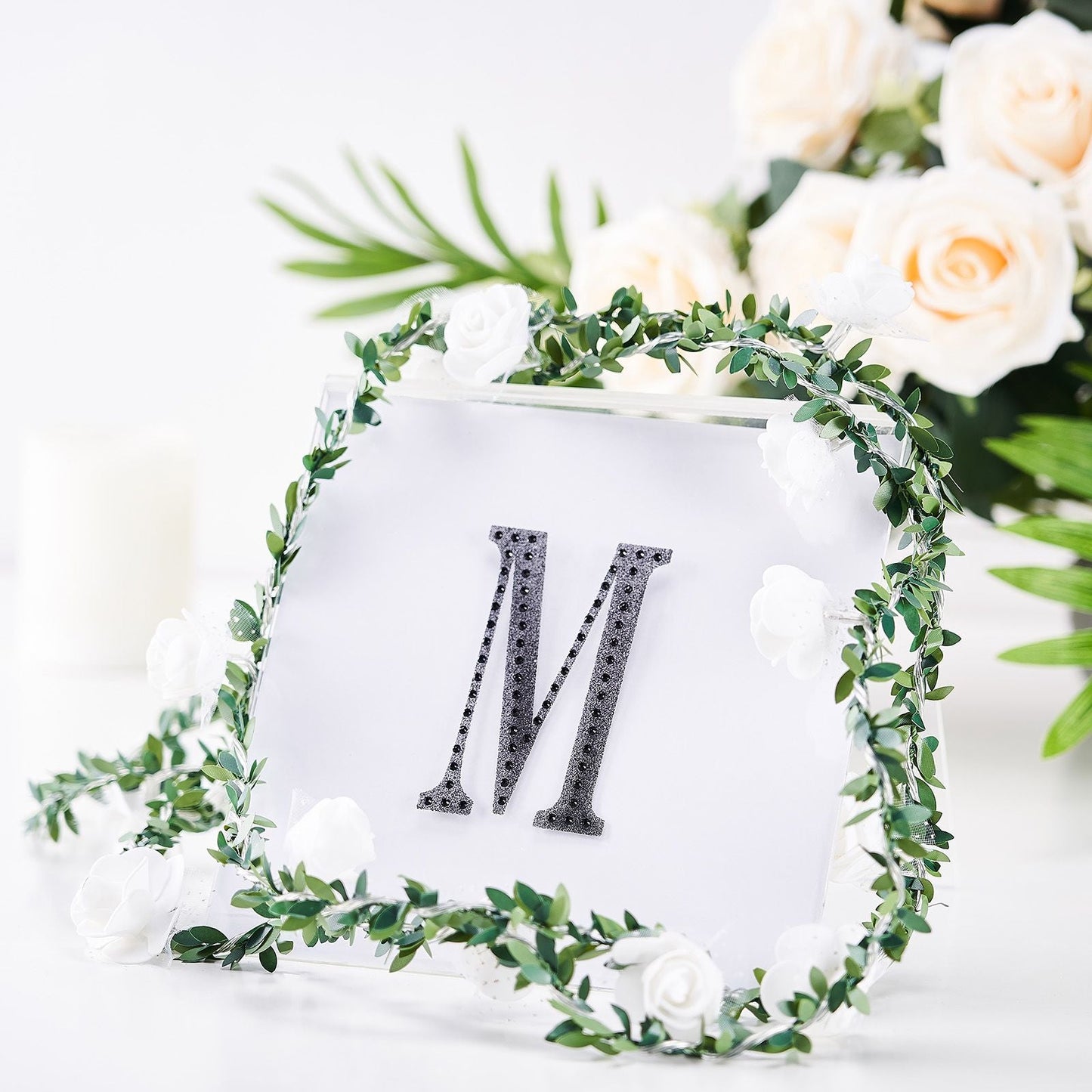 Black decorative rhinestone letter sticker "M" for DIY crafts.