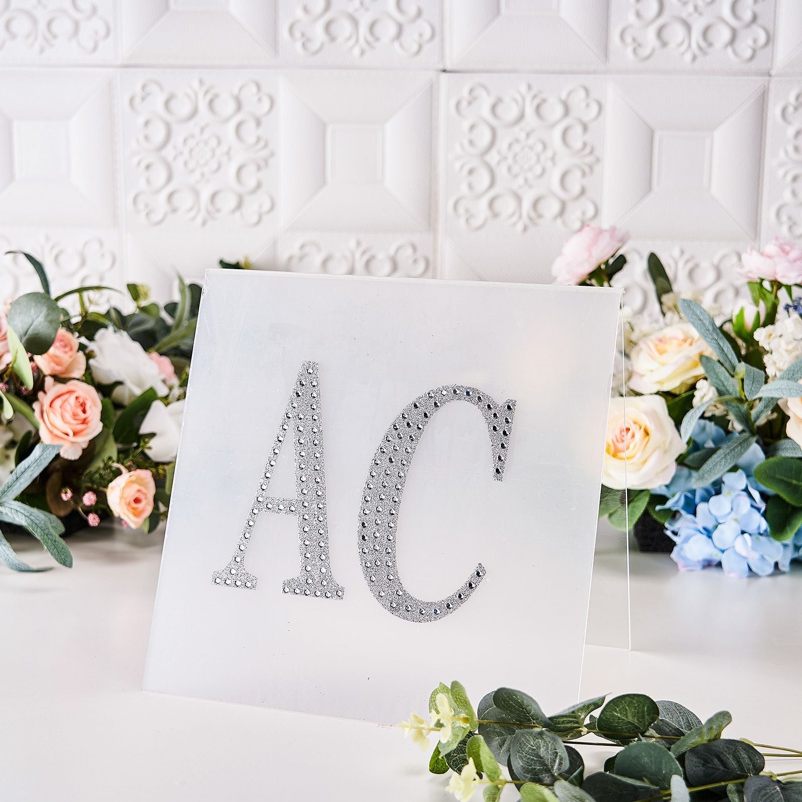 Silver decorative rhinestone letter stickers for DIY crafts.