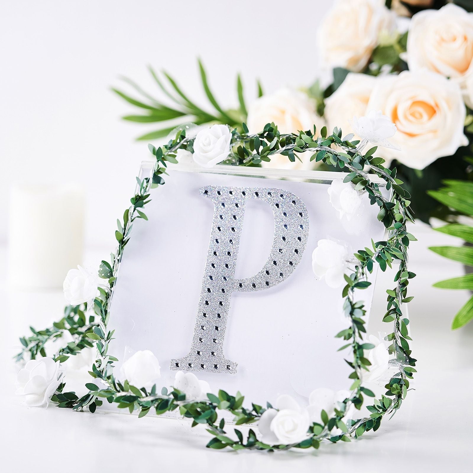 Silver decorative rhinestone letter "P" sticker for DIY crafts.