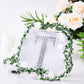 Silver decorative rhinestone letter "T" for DIY crafts.