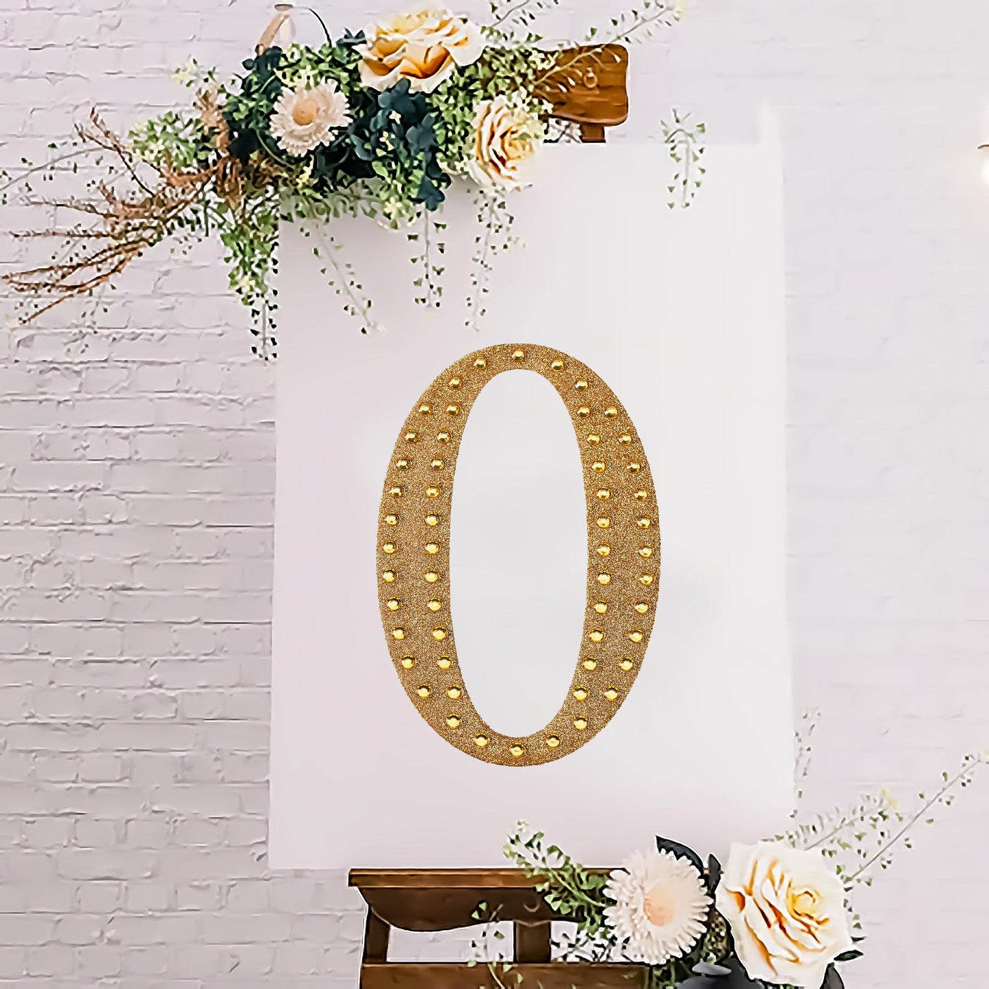 Gold decorative rhinestone letter "O" for DIY crafts.