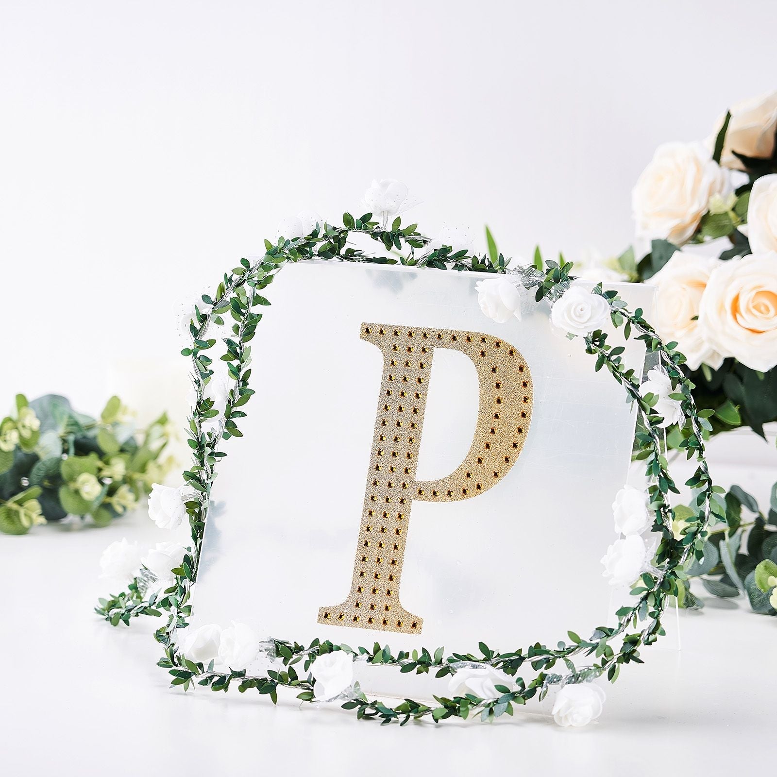 Gold decorative rhinestone letter sticker "P" with floral accents.