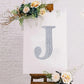 Silver decorative rhinestone letter "J" for DIY crafts.