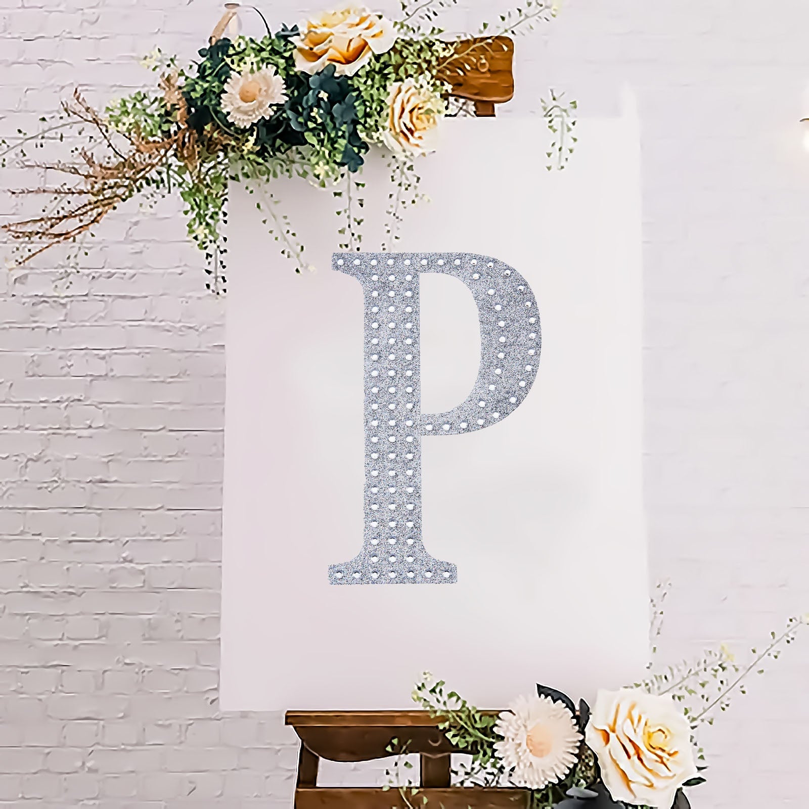 Silver decorative rhinestone letter "P" for DIY crafts.