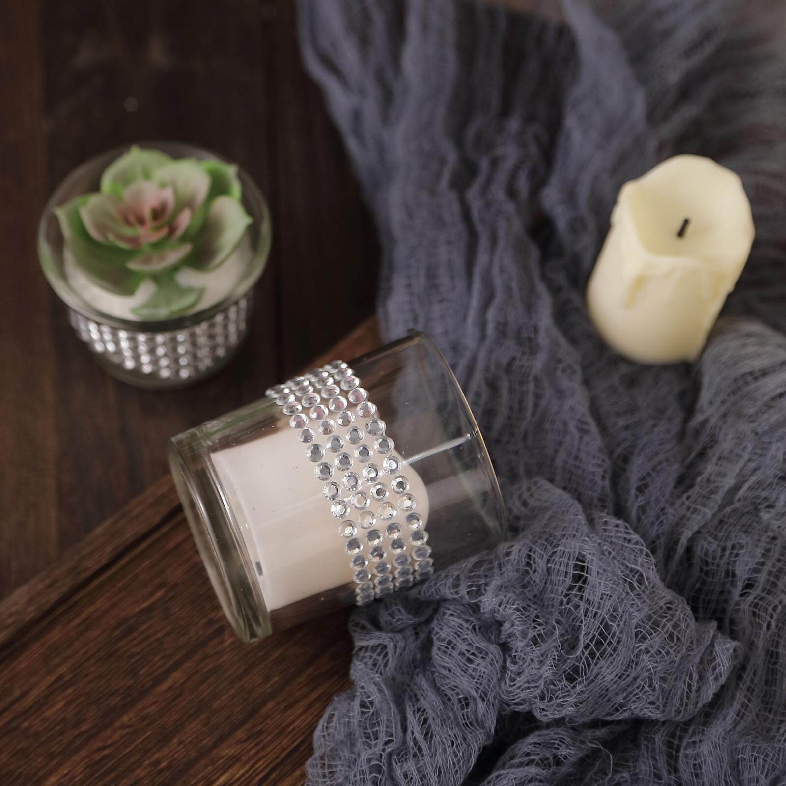 Silver rhinestone tape for DIY projects on a candle holder.