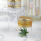Gold floral trim rhinestone stickers on clear containers.