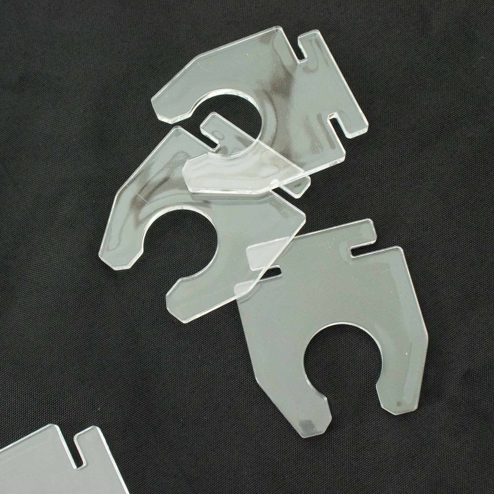 Clear acrylic glass holder hooks for display on champagne rack stand.