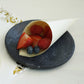 Natural eco-friendly disposable pine wood food cone with berries.
