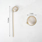 Eco-friendly bamboo cocktail sticks with black loop rings.
