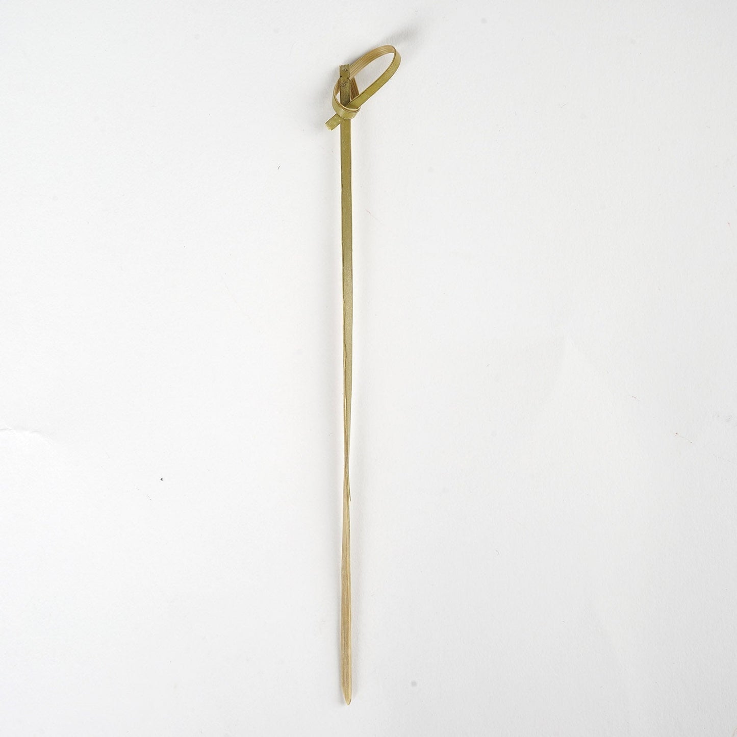 Eco-friendly twisted knot bamboo cocktail stick, 6 inches long.