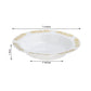 Gold embossed white disposable soup bowl with scalloped edges.