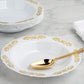 Gold embossed white disposable soup bowl with scalloped edges.
